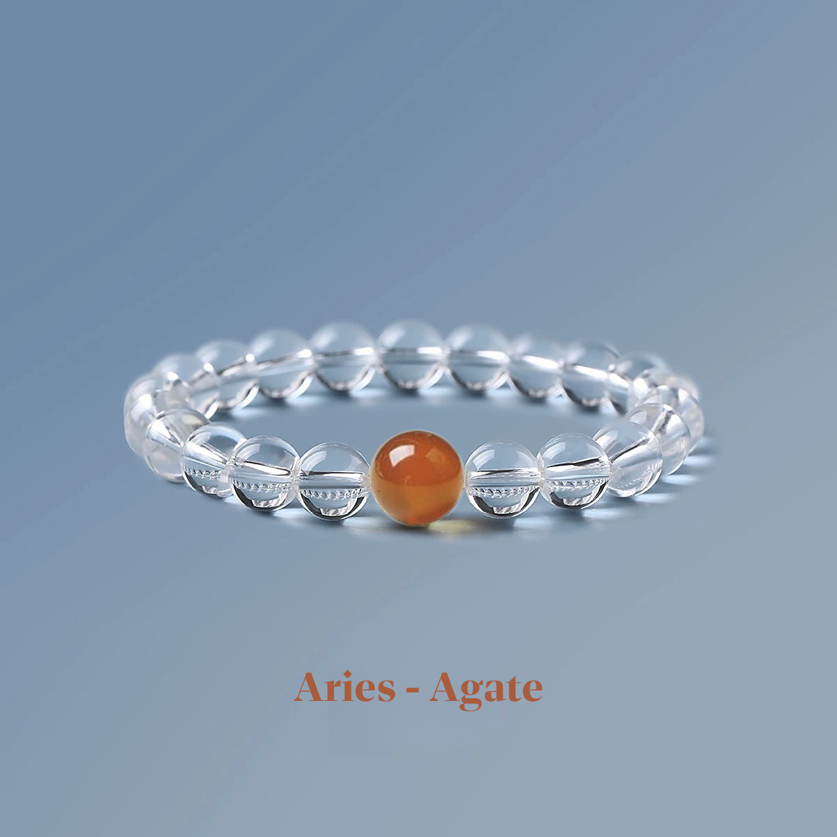 Clear quartz zodiac bracelet from the Healing Jewellery collection, featuring a central agate bead. Designed for Aries, this bracelet combines the clarity of quartz with the grounding, protective energy of agate.