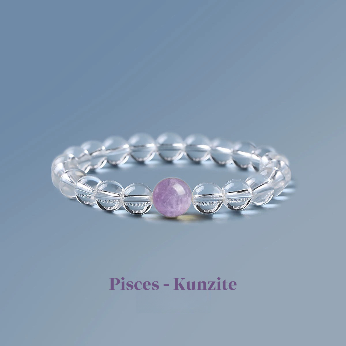 Clear quartz zodiac bracelet from the Healing Jewellery collection, featuring a central kunzite bead. Designed for Pisces, this bracelet combines the clarity of quartz with the calming, loving energy of kunzite.