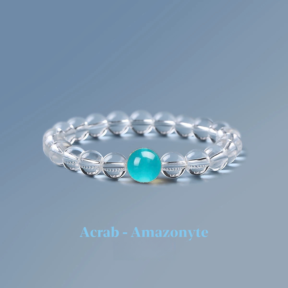 Clear quartz zodiac bracelet from the Healing Jewellery collection, featuring a central amazonite bead. Part of the zodiac bracelet series, this design combines the clarity of quartz with the calming energy of amazonite.